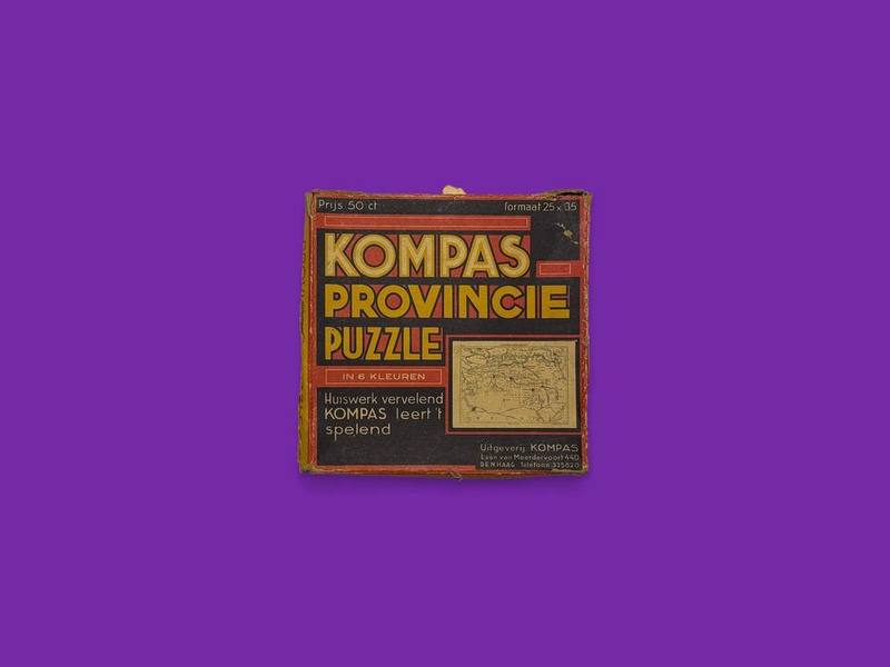 Kompas Provincie Puzzel photographed on Bruno's purple Applied Games background