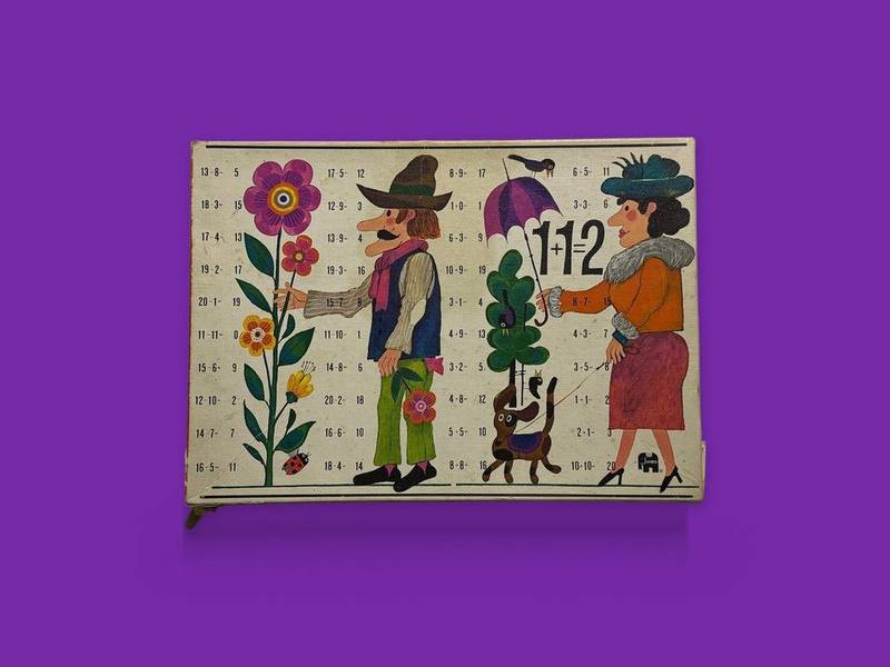 1+1=2 photographed on Bruno's purple Applied Games background