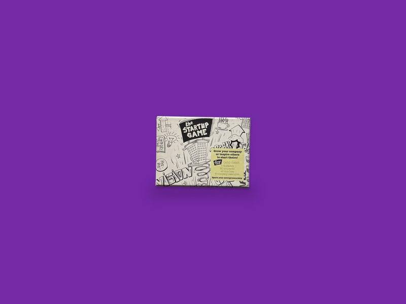 Startup Game photographed on Bruno's purple Applied Games background