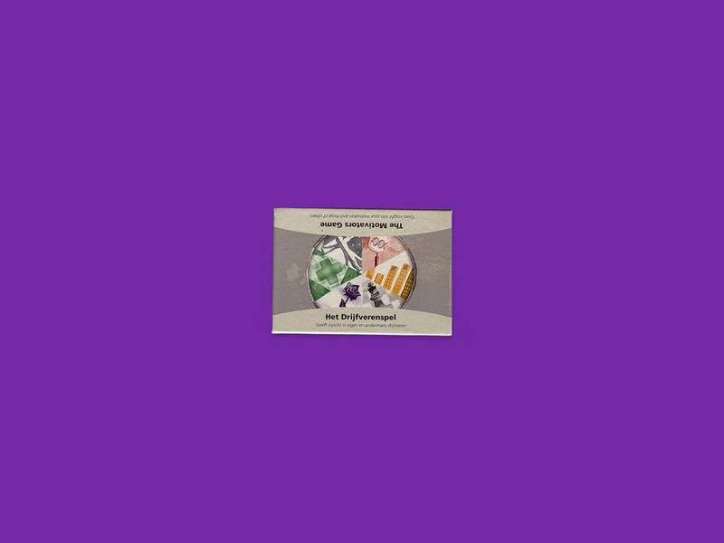 The Motivators Game photographed on Bruno's purple Applied Games background