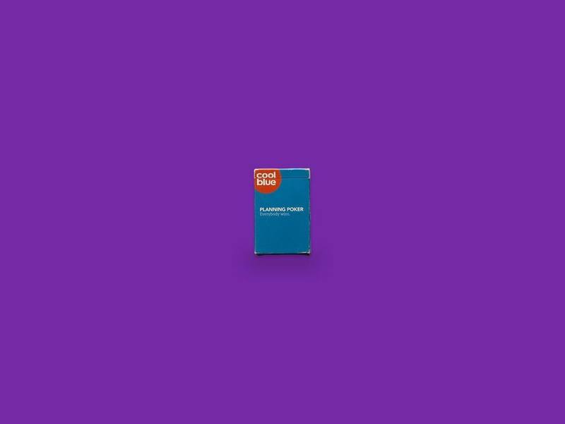 Planning Poker photographed on Bruno's purple Applied Games background