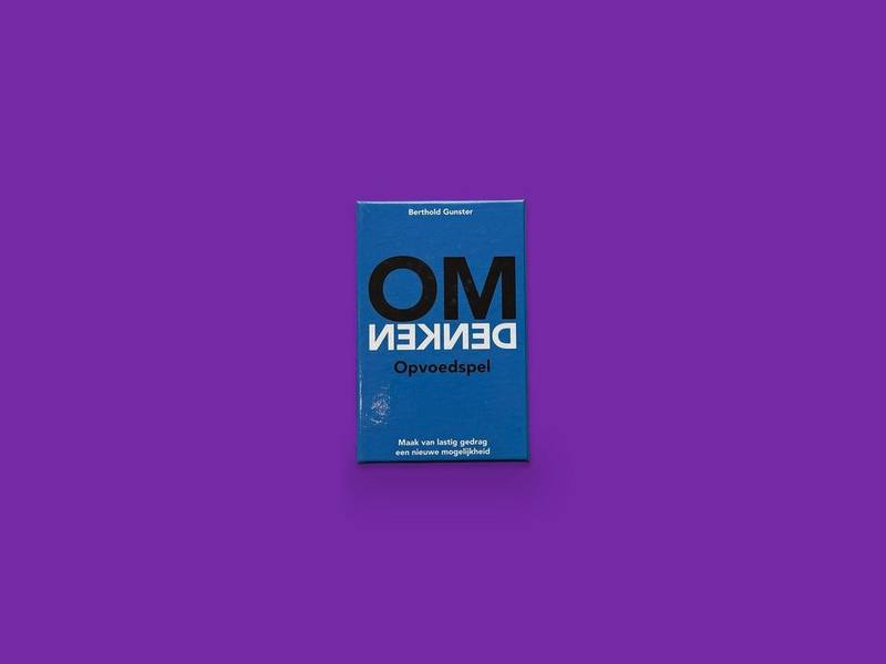 Omdenken Opvoedspel photographed on Bruno's purple Applied Games background
