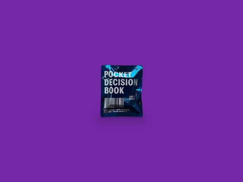 Pocket Decision Book photographed on Bruno's purple Applied Games background